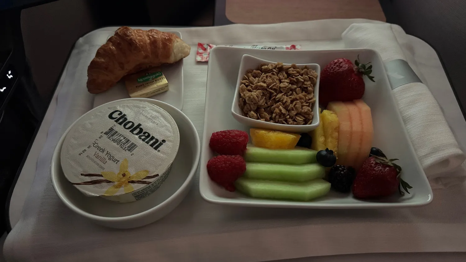 Fresh fruit, Greek yogurt, granola and a croissant… a great way to start the morning.
